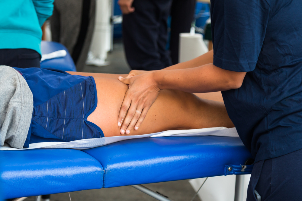 A woman performing physical therapy