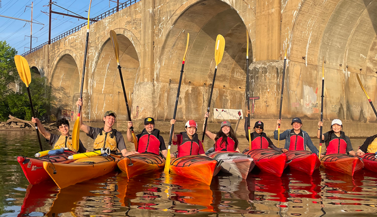Rutgers Students Go Outdoors Sunset Kayaking Trip on the Raritan River